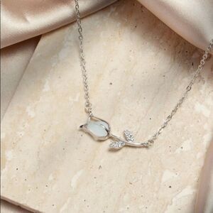 Elegant Silver White Stone Caged Rose Necklace